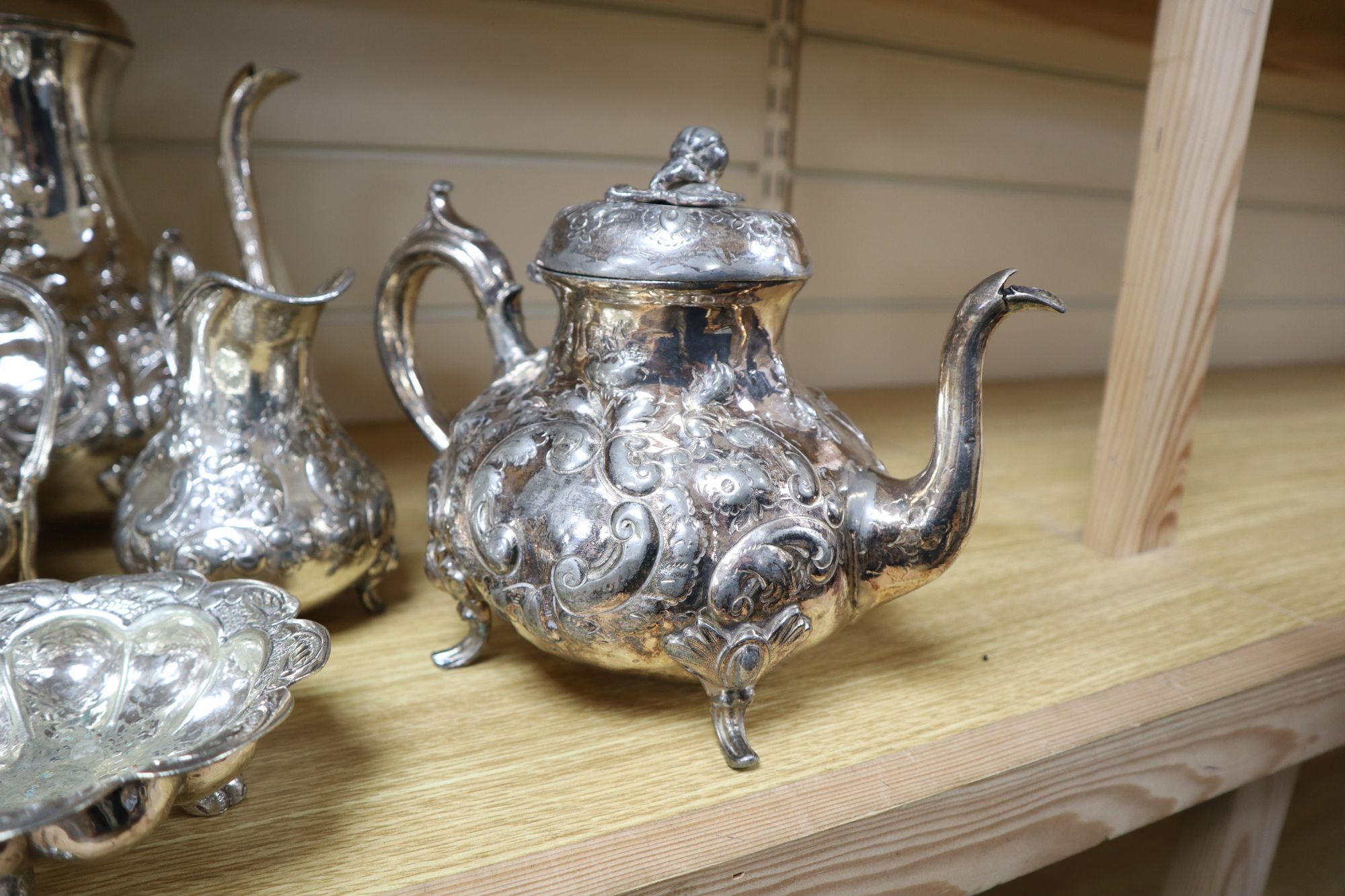 A three-piece plated teaset, sundry plated items and a leather box with plated mounts